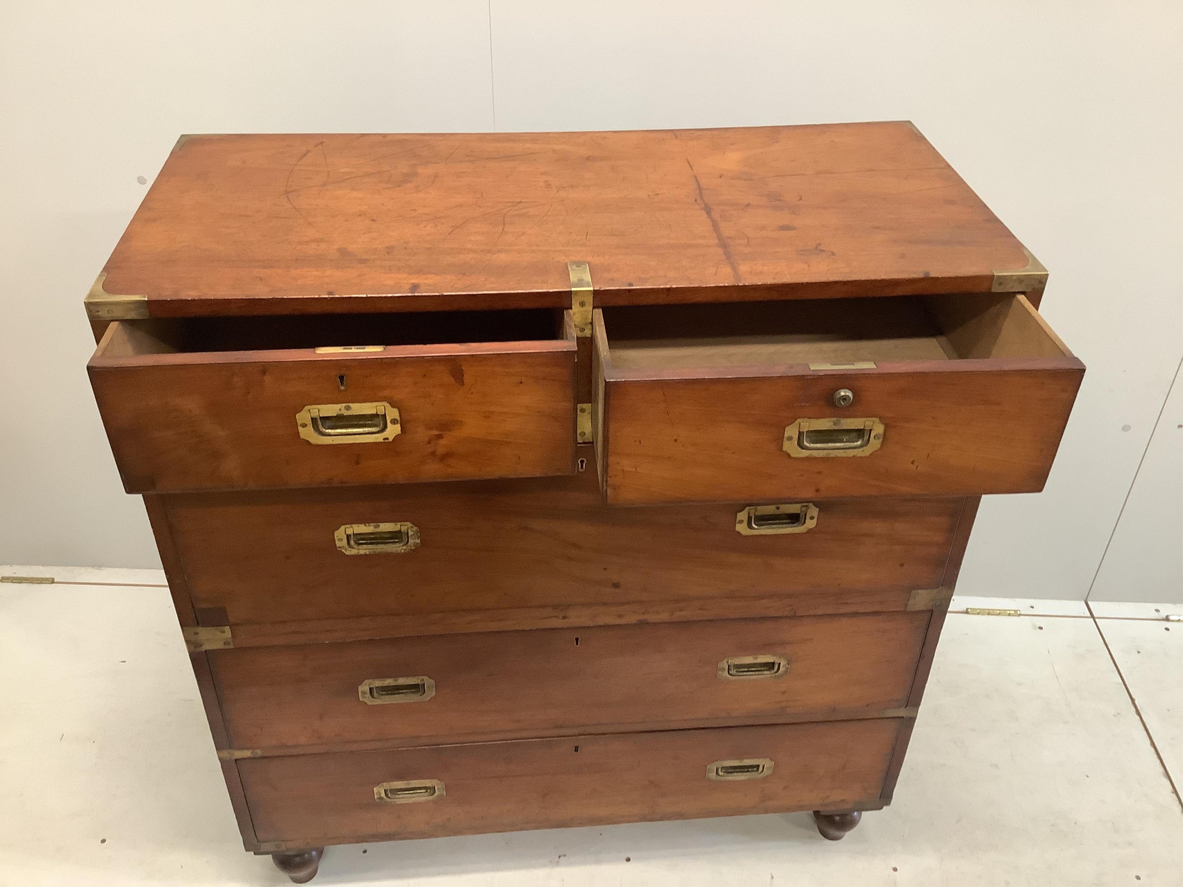 A late 19th century brass mounted mahogany two part military chest, width 99cm, depth 45cm, height 109cm. Condition - fair to good